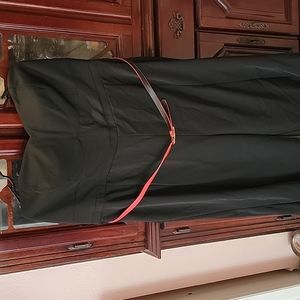 Torrid jump suit with a red belt size 2
